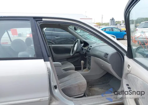 2001 Toyota Corolla Le from USA, damaged, VIN 2T1BR12E81C417614